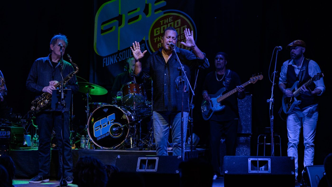 The band playing to a full room