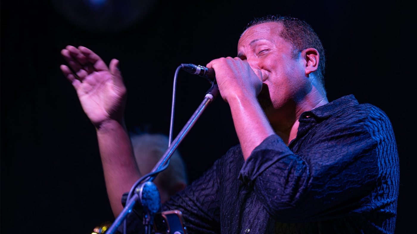 The band performing on stage